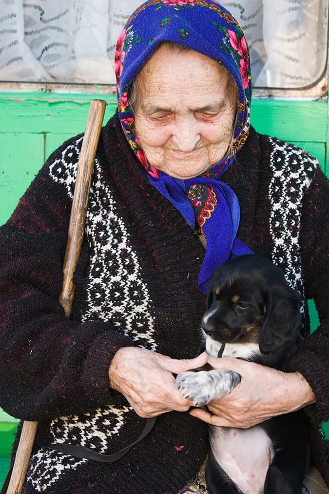 old lady with puppy